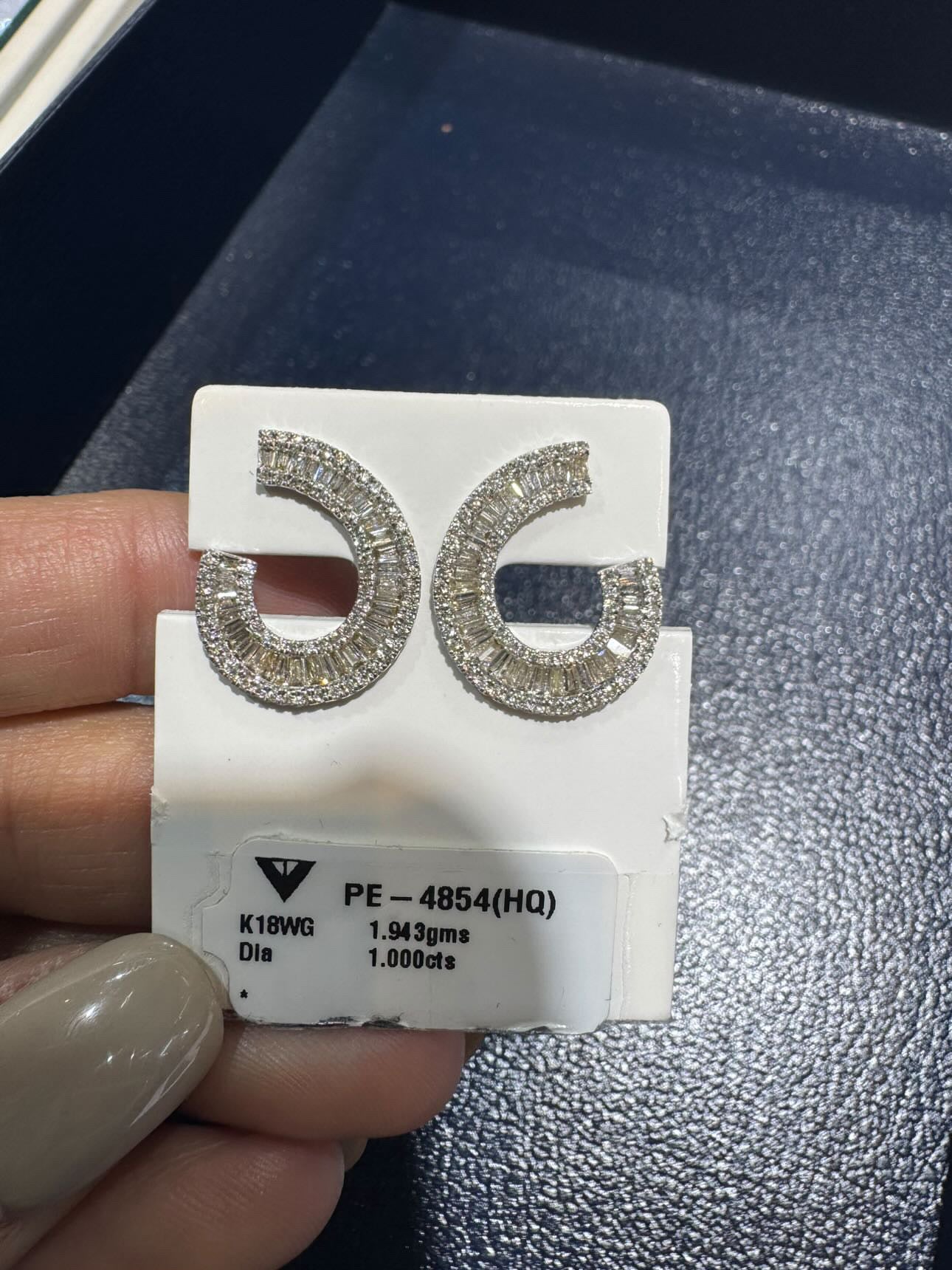Factory Item: J Baguettes Earrings in White Gold
