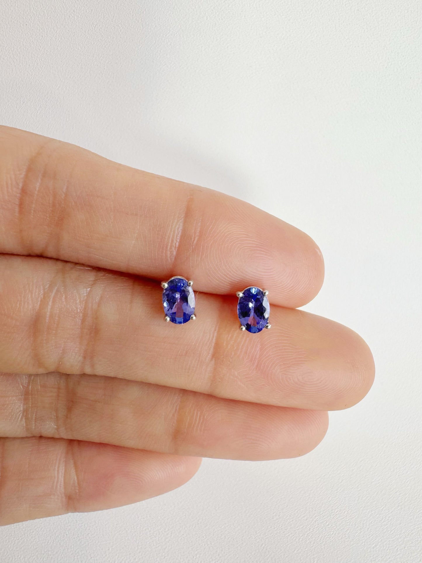 Tanzanite (Oval Cut) Stud Earrings in 18K White Gold
